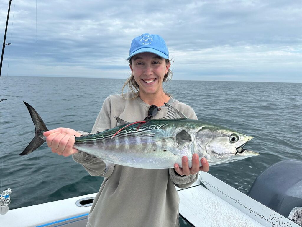 Fisherwoman Holding Albie