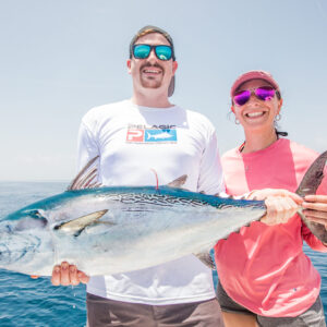 Couple Holding Fish