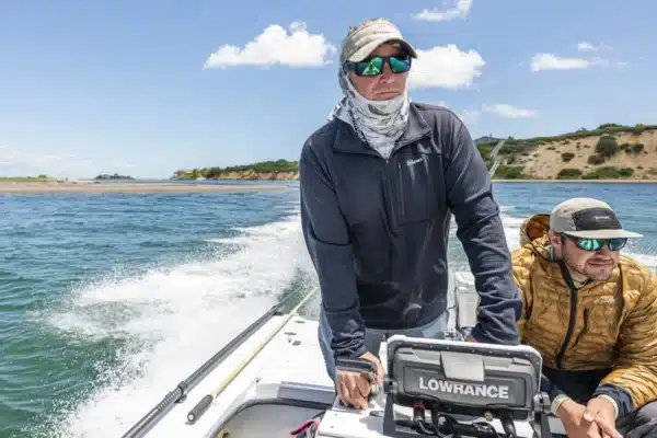 Guides drive a boat